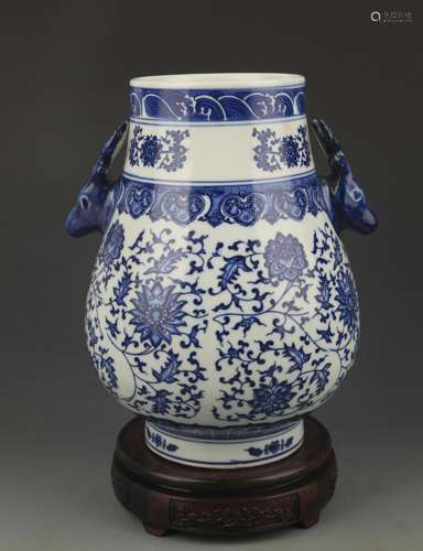 A BLUE AND WHITE LOTUS AND FLOWER DEER HANDLE VASE