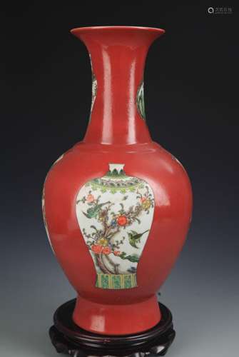A RED CORAL GROUND FAMILLE VERTE DECORITIONAL VASE