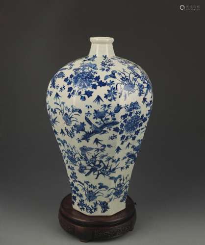 A BLUE AND WHITE, FLOWER AND BIRD PAINTED VASE