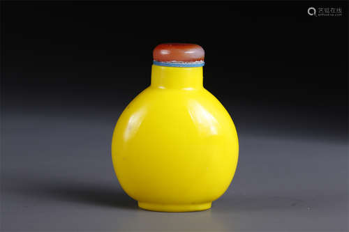 A Yellow Glass Snuff Bottle.