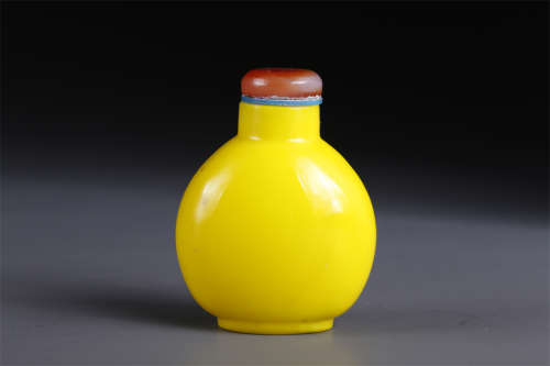 A Yellow Glass Snuff Bottle.