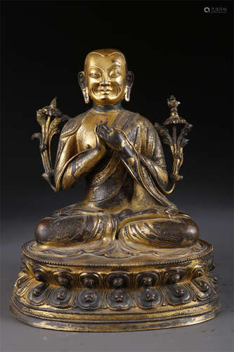 A Gilt Copper Guru Buddha Statue.