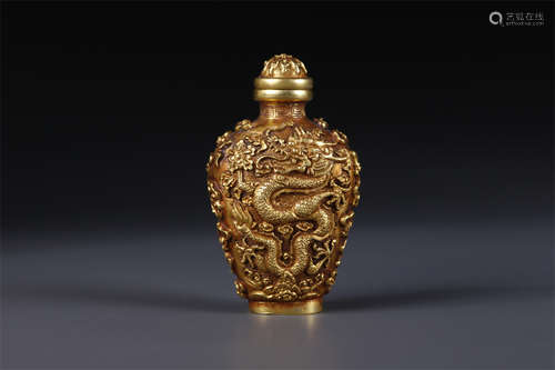 A Pure Gold Snuff Bottle with Dragon Design.