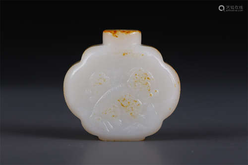 A Hetian Jade Snuff Bottle with Lion Design.