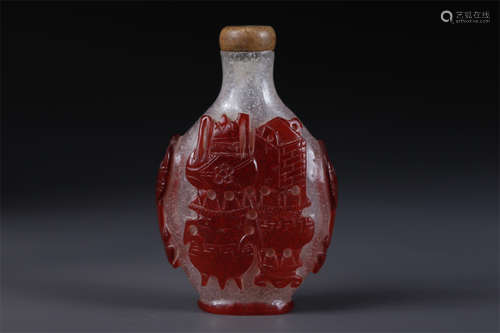 A Glass Snuff Bottle with Curio Design.