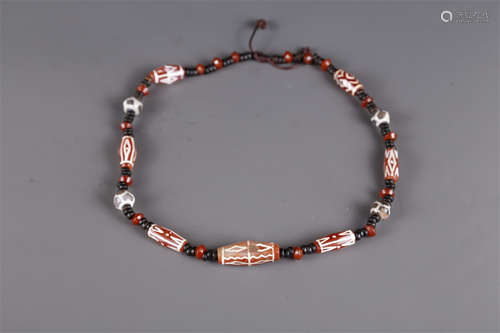 A Necklace of Agate Beads.