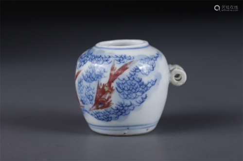 A Blue-and-White Porcelain Bird Food Jar.