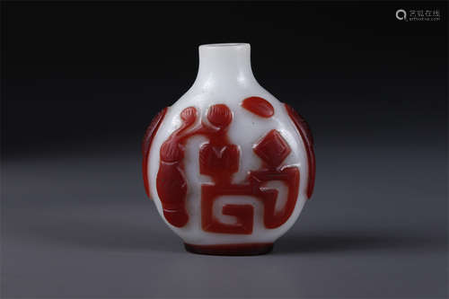 A Glass Snuff Bottle with Curio Design.