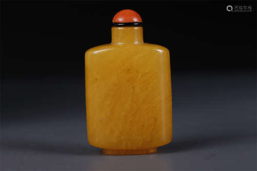 An Amber Snuff Bottle.