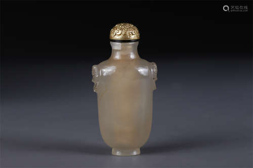 An Agate Snuff Bottle with Beast Face Design.