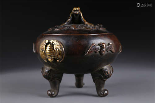 A Tripod Copper Incense Burner.