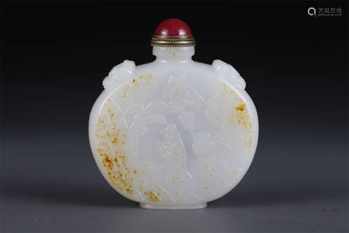 A Hetian Jade Snuff Bottle with Figure Motif.