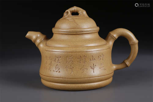 A Bamboo Joint Shaped Purple Clay Teapot.