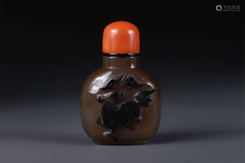 An Agate Snuff Bottle with Kylin Design.