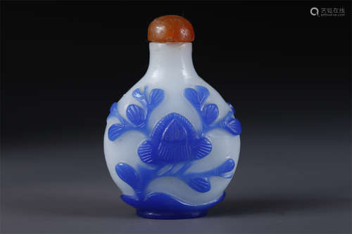 A Glass Snuff Bottle with Flowers Design.