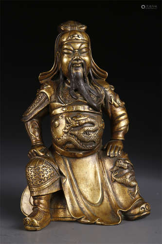 A Gilt Copper Sitting Guangong Statue.