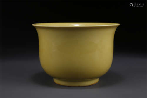 A Yellow Glazed Bell Shaped Porcelain Cup.