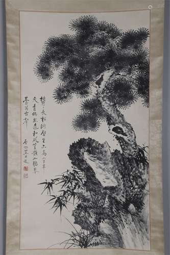 A Bamboo and Rock Painting by Qi Gong.