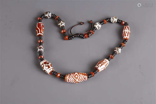 A Necklace of Agate Beads.