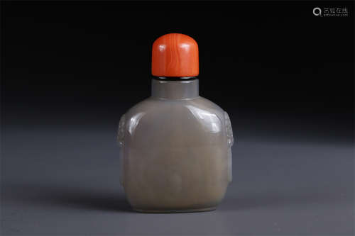 An Agate Snuff Bottle with Beast Face Design.