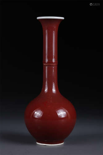 A Red Glazed Long-Neck Porcelain Bottle.