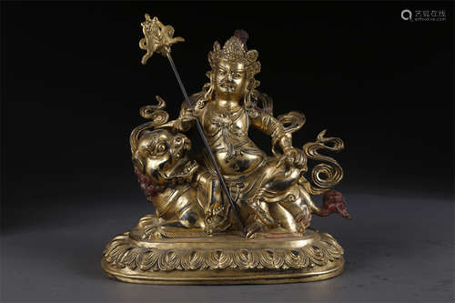 A Gilt Copper Vaisravana Buddha Statue.