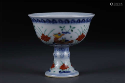 A Rose Porcelain Goblet with Flowers Design.