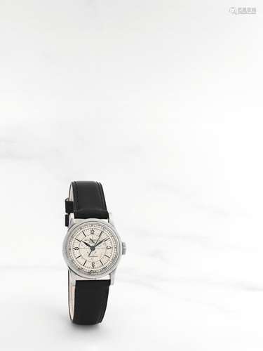 PATEK PHILIPPE. RARE MONTRE BRACELET EN ACIER DOUBLE SIGNATU...