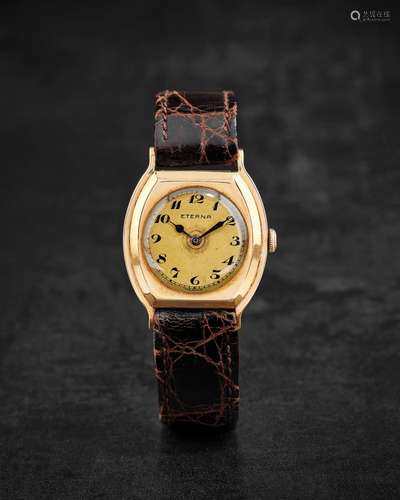 ETERNA. RARE MONTRE BRACELET EN OR 14K (585) DE FORME TONNEA...