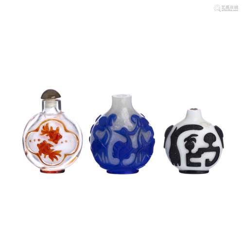 Three Chinese snuff bottles in 'Overlay' glass