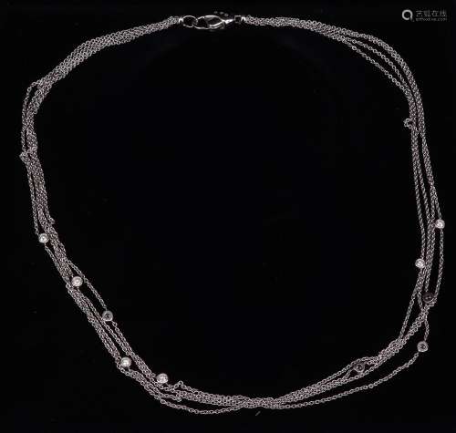 Collier, 585er WG, bestehend aus 4 Ketten und 10 Brillanten,...