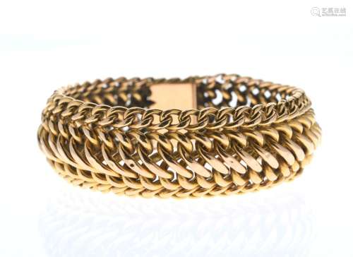 BRACELET en or jaune 750/°° maille gourmette signé Caplain P...