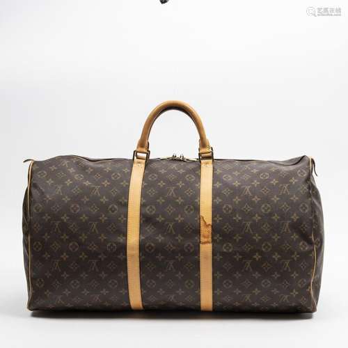 LOUIS VUITTON - SAC modèle "Keepall" 60 cm en toil...