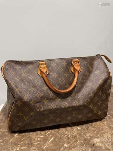 LOUIS VUITTON - SAC modèle "Speedy" 35 cm en toile...