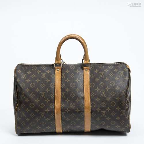 LOUIS VUITTON - SAC modèle "Keepall" 45 cm en toil...