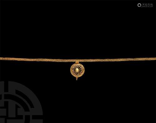 Roman Gold Necklace with Sun Whorl Pendant