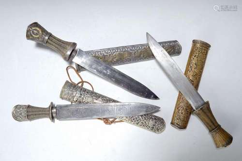 3 daggers, Tibet, around 1900 and secondary, silver