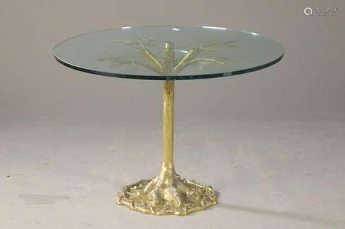 Round glass table, base made of brass/bronze, in the shape