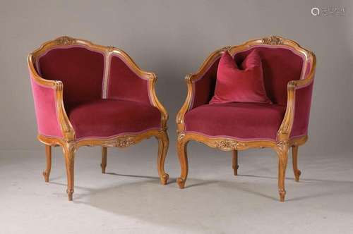 pair of finely carved bergeres or armchairs, around