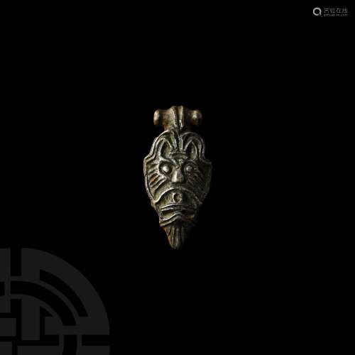 Viking Age Silver Pendant with Bearded Mask