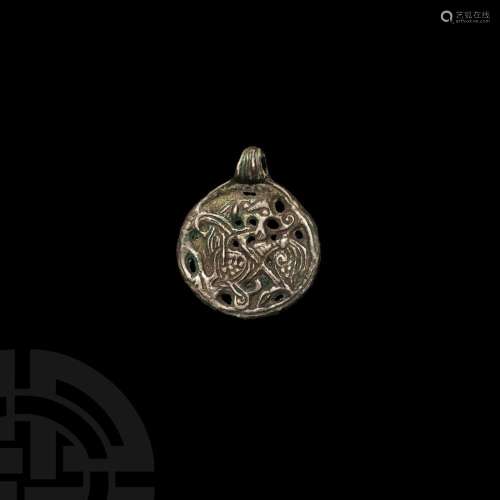 Viking Age Silver Pendant with Borre-Style Gripping Beast