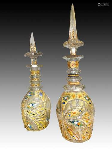 A PAIR OF BOHEMIAN DECANTERS WITH HEAVY GOLD GILDING & E...