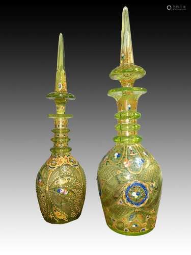 A PAIR OF URANIUM BOHEMIAN DECANTERS WITH ENAMEL WORK FOR IS...