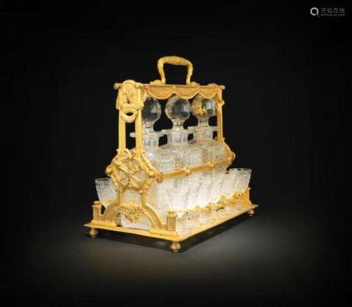 A BACCARAT CUT GLASS AND GILDED BRONZE TANTALUS AND LIQUEUR ...