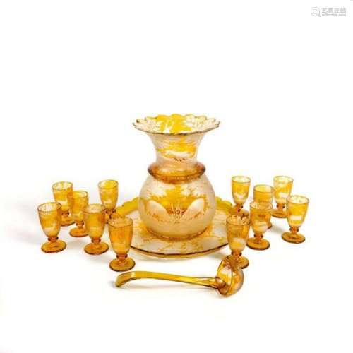 A BOHEMIAN AMBER-STAINED AND ENGRAVED PUNCH SET, LATE 19TH C...