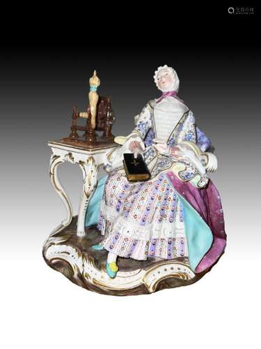 A Meissen Group Of A Lady With A Spinning Wheel Circa 1880