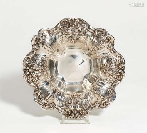 Silver serving bowl with grapes and pomegranates