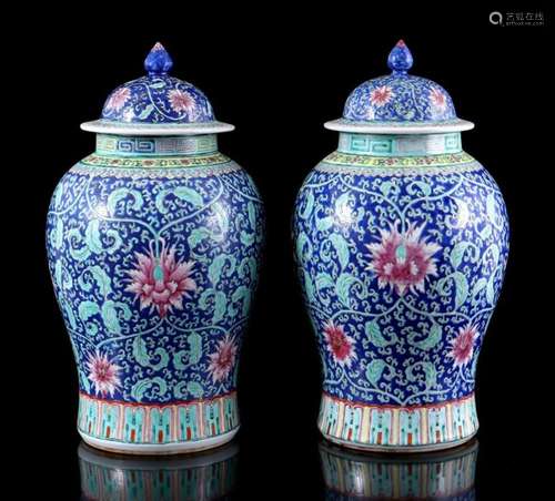 2 PORCELAIN LIDDED VASES WITH POLYCHROME FLORAL DECOR