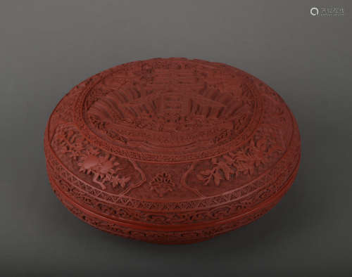 A carved lacquerware box and cover