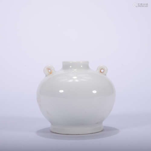 A white glazed vase